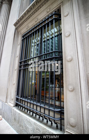 bars on the windows of the Federal reserve bank of Chicago Illinois USA Stock Photo