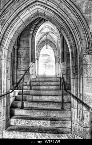 Staircase leading from Lower Crypt level to the Nave on the main level of the Washington National Cathedral Stock Photo