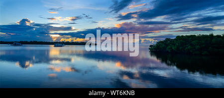 Storm clouds forming over the ocean at sunrise in Key West Stock Photo