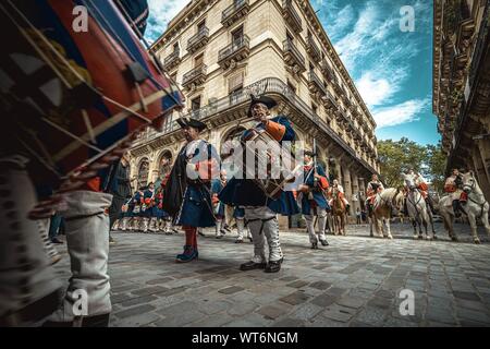 Barcelona, Spain. 11th Sep, 2019. Members of the 'Miquelets of Barcelona', historic dressed soldiers, take part in a march through Barcelona on the 'Diada' (Catalan National Day) Credit: Matthias Oesterle/Alamy Live News Stock Photo