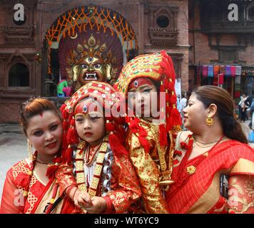 Kathmandu, Nepal. 11th Sep, 2019. Girls are carried by their mothers during the mass Kumari Puja on the occasion of Indrajatra Festival in Kathmandu, Nepal, Sept. 11, 2019. Over 50 girls attended the mass Kumari Puja for better health and prosperity. Credit: Sunil Sharma/Xinhua Credit: Xinhua/Alamy Live News Stock Photo