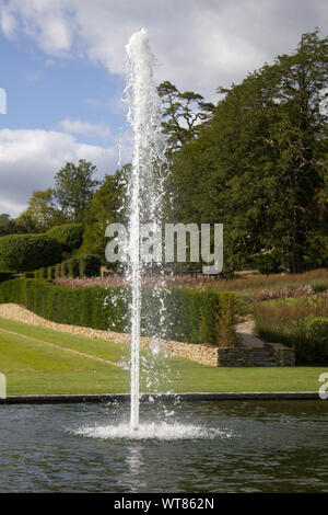 A water feature and fountain in the middle of a pond at the Newt in Somerset.1 Stock Photo