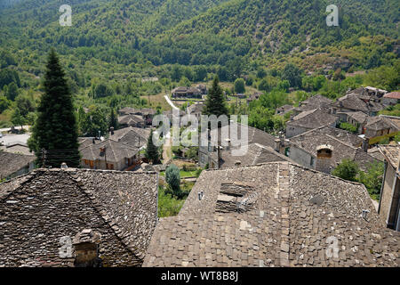 The village of Kipoi in the Zagoria region of northern Greece. Limestone cottages huddled together on a hillside. Stock Photo
