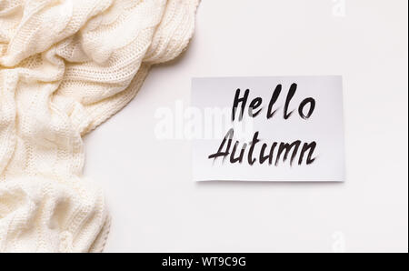 White wool scarf with creative text on white background Stock Photo