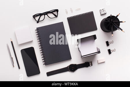 Modern workplace with modern office stationery on white Stock Photo