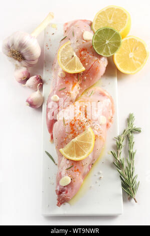 Top View of Two Marinated Rabbit Legs Stock Photo