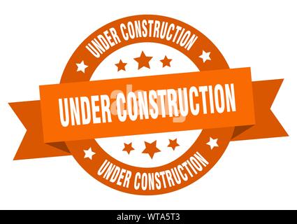 under construction ribbon. under construction round orange sign. under construction Stock Vector
