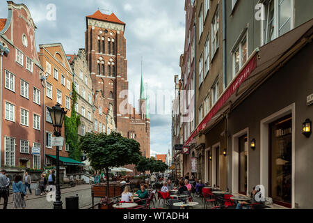 Piwna Street in Gdansk old town, Poland. St Mary's church in the distance. Stock Photo