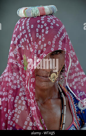 Rajasthani woman with traditional clothes and nose ring Stock Photo