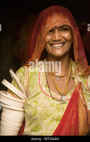 Beautiful Rajasthan woman wearing traditional clothes, smiles Stock Photo