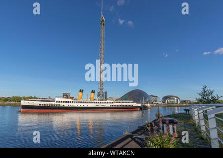 Tss (Turbine Steam Ship) Queen Mary berthed on the River Clyde at the Science Museum and the Observation tower, Glasgow, Scotland,UK. Stock Photo