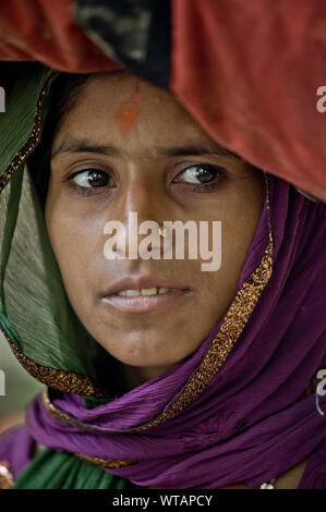 Traditional Indian girl wearing colorful clothes Stock Photo