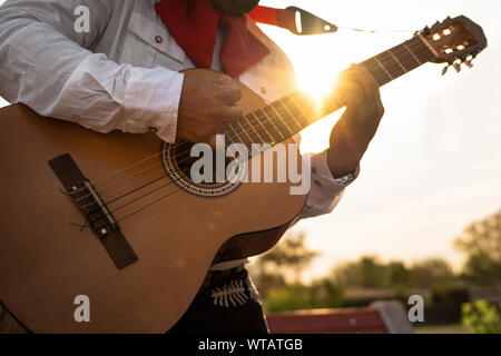 Mexican musicians mariachi playing the guitar Stock Photo