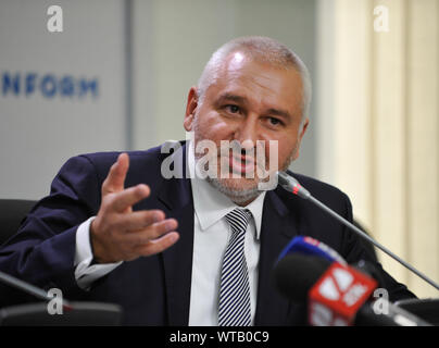 Mark Feygin, lawyer of Ukrainian journalist  and prisoner recently released by Russia Roman Suschenko speaks during a press conference in Kiev.Roman Suschenko was a Paris correspondent for the Ukrainian national news agency Ukrinform and he was detained on September 30, 2016 in Moscow, where he arrived with a private trip from Paris. On October 7, 2016, he was charged with espionage. On June 4, 2018, the Moscow City Court sentenced Sushchenko to 12 years in a maximum security prison. The exchange of prisoners between Ukraine and Russia took place on 07 September 2019. Stock Photo