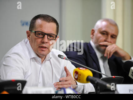 Roman Suschenko, Ukrainian journalist of the national news agency Ukrinform and prisoner recently released by Russia (L) and his lawyer Mark Feygin (R) attend  a press conference in Kiev.Roman Suschenko was a Paris correspondent for the Ukrainian national news agency Ukrinform and he was detained on September 30, 2016 in Moscow, where he arrived with a private trip from Paris. On October 7, 2016, he was charged with espionage. On June 4, 2018, the Moscow City Court sentenced Sushchenko to 12 years in a maximum security prison. The exchange of prisoners between Ukraine and Russia took place on Stock Photo