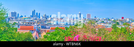 Panoramic view from Golden Mount Temple on the old poor district and the high rises of modern city on the background, Bangkok, Thailand Stock Photo