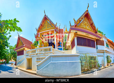 BANGKOK, THAILAND - APRIL 24, 2019: The panoramic view on shrine located on the curved road leading to the Wat Saket Temple, on April 24 in Bangkok Stock Photo