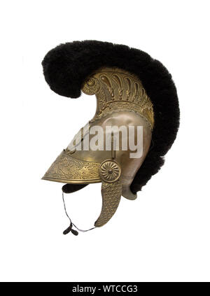 French firefghter helmet, model 1816. Entirely brass with neck brace surmounted by a crest. Stock Photo