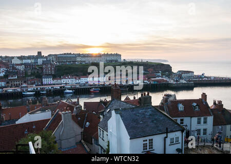 Sunset at Whitby West Cliff at Whitby, North Yorkshire Stock Photo