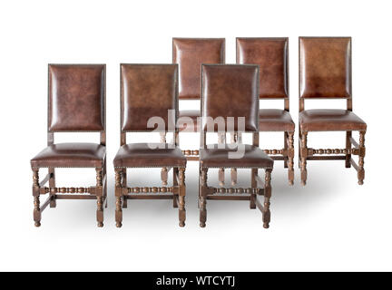 Set of old fashioned wood chairs on the white background. Stock Photo