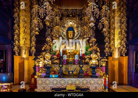 Golden Buddha Statue in Chion-in Temple, Kyoto, Japan Stock Photo