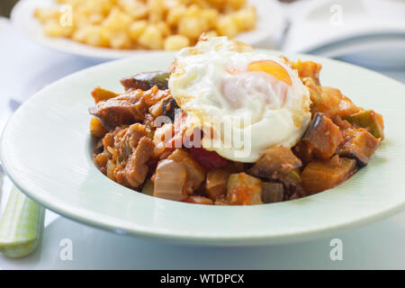 homemade spanish starter made with tomato sauce and veggies called pisto Stock Photo