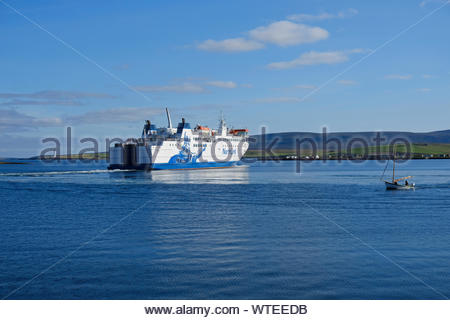 Northlink car and passenger ferry MV Hamnavoe departing Stromness harbour Orkney, for Scrabster on mainland Scotland Stock Photo