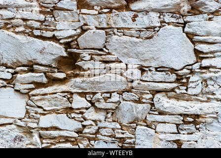 Weathered stone painted wall texture from Turkey. Wallpaper. Stock Photo