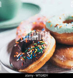 Front and top view of a group of sweet donuts, close up Stock Photo