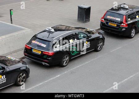 Stockholm, Sweden - September 10, 2019: High angle view of Taxi Stockholm taxis at the Stockholm Central station taxi stand waiting for customers. Stock Photo