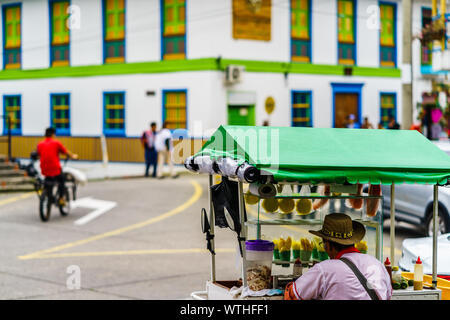 View on market trader selling foofs in the village Filandia of Colombia Stock Photo