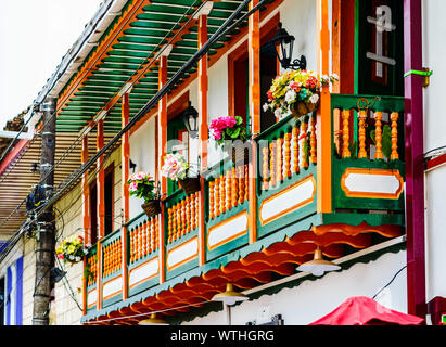 View on Colourful colonial style wooden balconies in Filandia Colombia Stock Photo