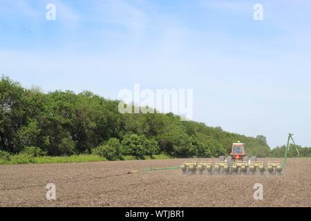 A farmer planting soybeans in the spring in Central Illinois Stock Photo