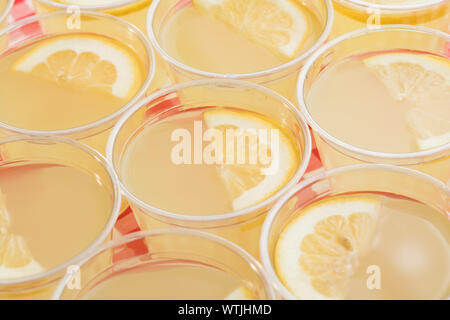 Lemonade in disposable cups Stock Photo