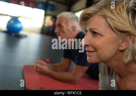 active sportive people doing exercise Stock Photo