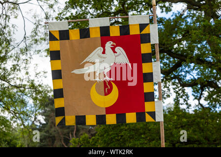 Eagle and crescent flag at medieval fayre. Stock Photo