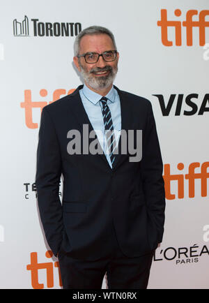 Toronto, Canada. 11th Sep, 2019. Director Giuseppe Capotondi poses for photos before the North American premiere of the film 'The Burnt Orange Heresy' at Roy Thomson Hall during the 2019 Toronto International Film Festival (TIFF) in Toronto, Canada, on Sept. 11, 2019. Credit: Zou Zheng/Xinhua Stock Photo