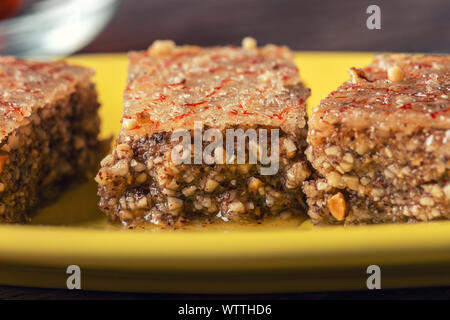 Pieces of Sheki halva on a plate. Eastern sweets Stock Photo