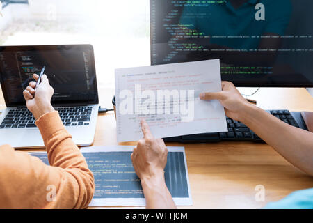 Asian team Outsource Developer Looking Screen Programming Code Working ...