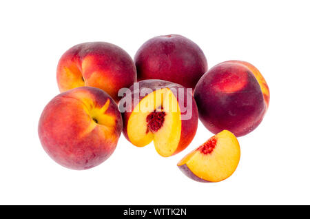 Several ripe sweet peaches isolated on white background. Studio Photo Stock Photo