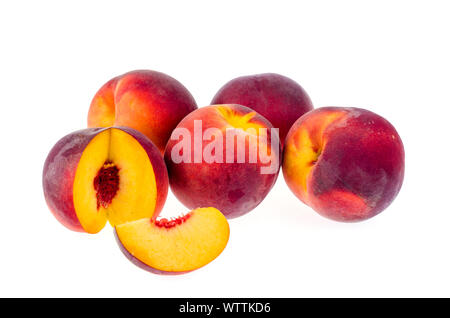 Several ripe sweet peaches isolated on white background. Studio Photo Stock Photo