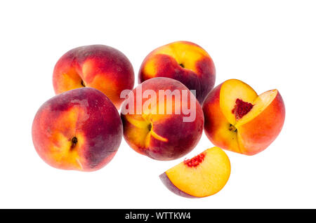 Several ripe sweet peaches isolated on white background. Studio Photo Stock Photo