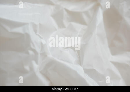 Abstract crumpled clean white plastic surface close up view Stock Photo