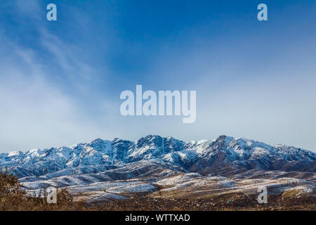 Picturesque mountain alps partially covered by snow, late fall Stock Photo