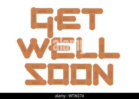 A get well soon message using medical sticking plasters isolated on white with clipping path Stock Photo