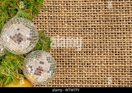 Glass ball ornaments on a Christmas tree Background Striped cloth with clipping path. Stock Photo