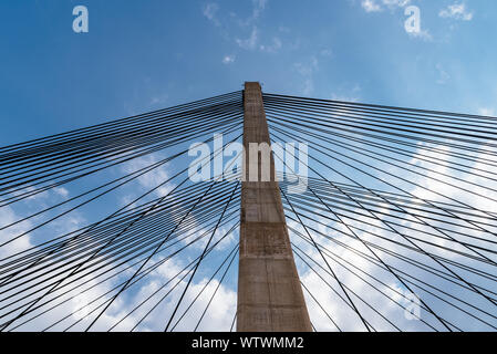 Modern suspension bridge. Detail of tower and steel cables. Barrios de Luna, Castile and Leon, Spain. Stock Photo