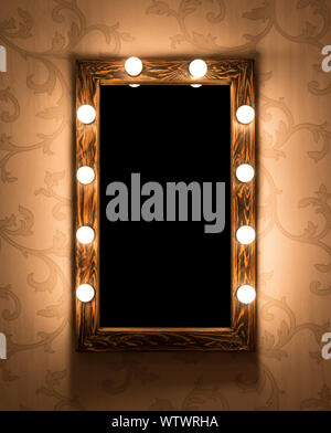 Woman's makeup place with mirror and bulbs Stock Photo