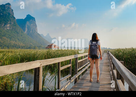 Young woman relaxing in park. Sam Roi Yod National Park, Thailand Stock Photo