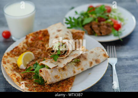 Traditional delicious Turkish food; Turkish lahmacun.top view. Stock Photo